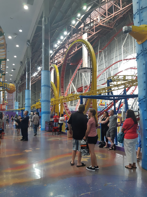 A photo of the Mindbender in 2021, with people surrounding the hallway around her