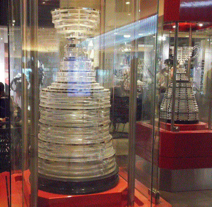 A closeup of the stanley cup replica. It's made up of layers of glass.