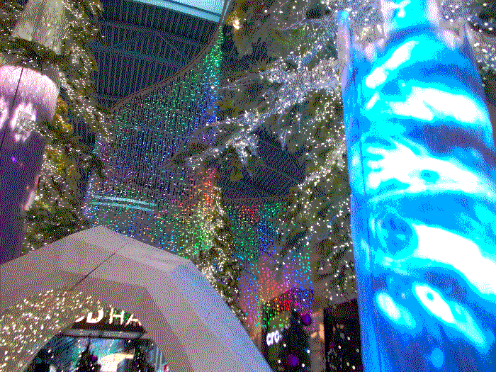 Another angle, standing in the middle of the display and looking up at the ceiling through light adorned fake leaves.